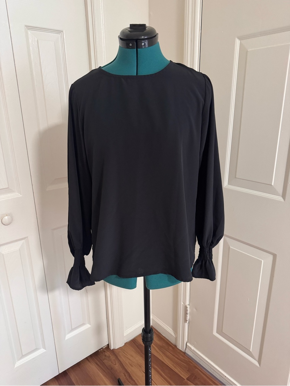 Classic Black Long-Sleeve Blouse with Cuffed Sleeves